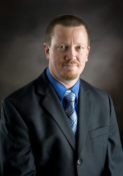 Mr Christopher B Wencker