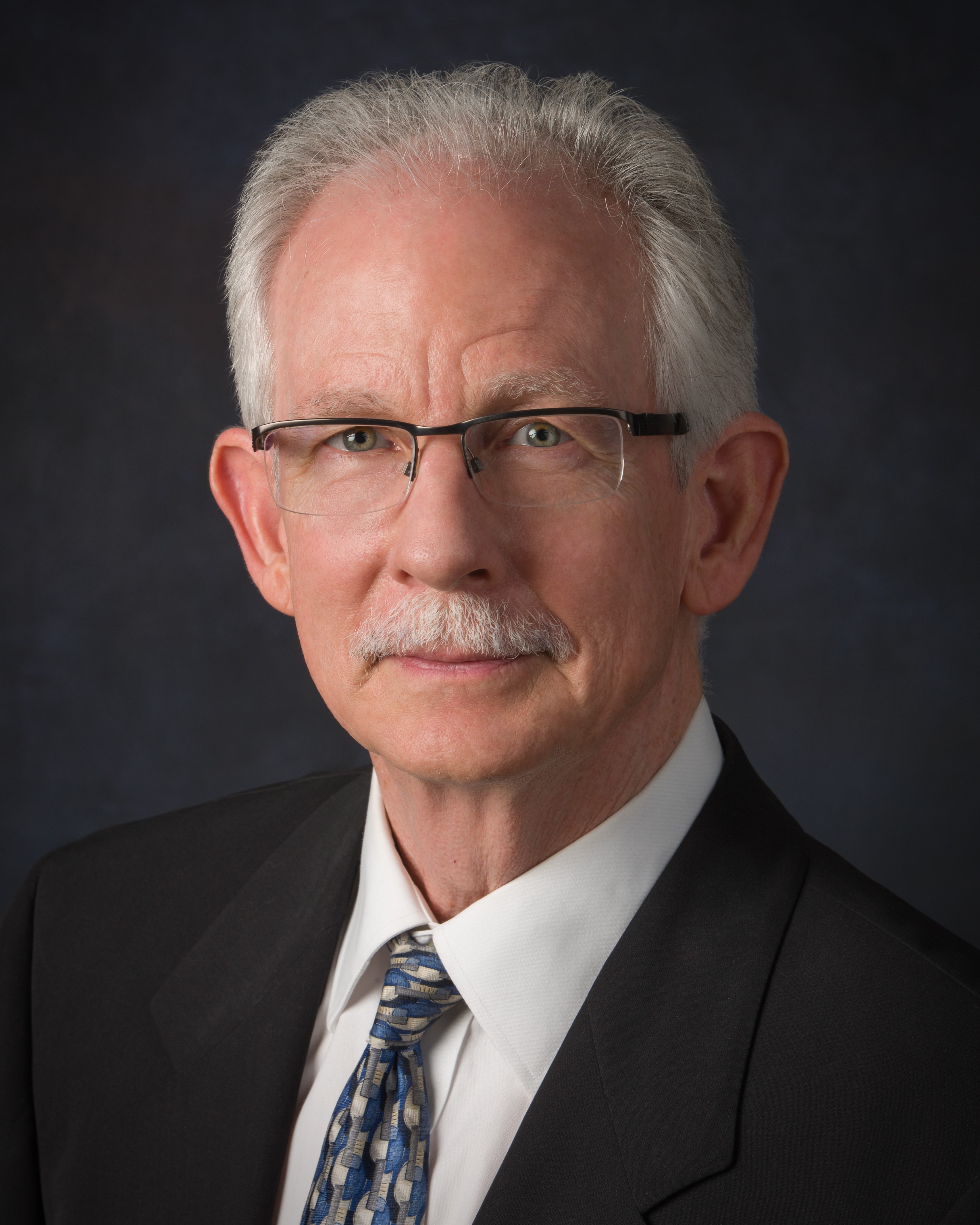 Mr Robert H Oberbillig