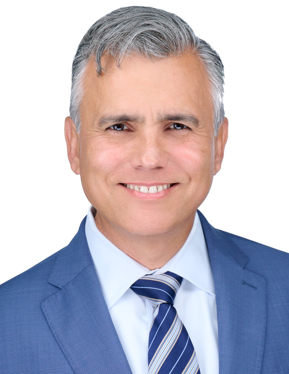 Mr Edward R Flores Esq