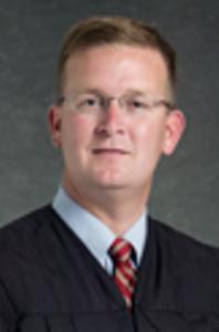 Hon Christopher T Whitten